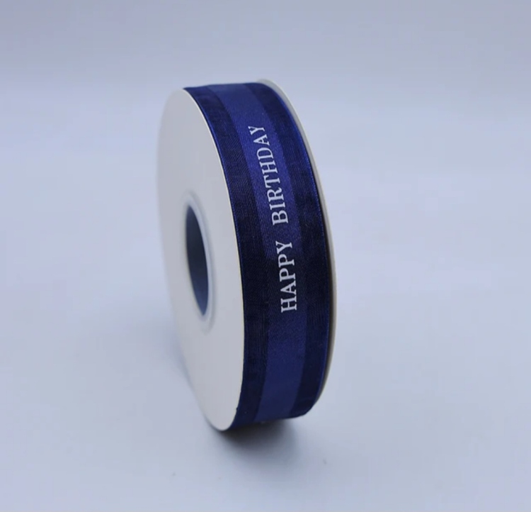 شبر عريض 2.5 سم مطبوع happy birthday  لون نهدي 45 يارده 